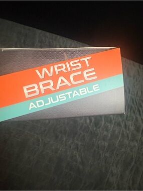 Adjustable Wrist Brace - Red and Teal Packaging